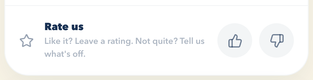 The Rate us row in Settings, with a thumbs up and a thumbs down button