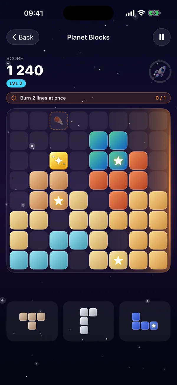 A Planet Blocks board with the new artwork: textured planet pieces, a gold artifact with a shimmering star, a meteor warning in the top row and three pieces waiting in the tray
