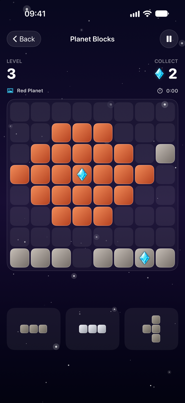 Crystal Hunt level 3, Red Planet: a pixel picture of Mars made of orange blocks on the star grid, a row of grey rocks under it, crystals on two blocks, the goal of two crystals at the top and three pieces in the tray